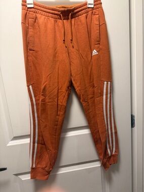 adidas Rust Orange Track Pants with White Stripes